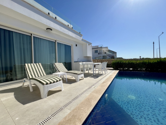 Sea front 3 bedroom garden apartment with private swimming pool